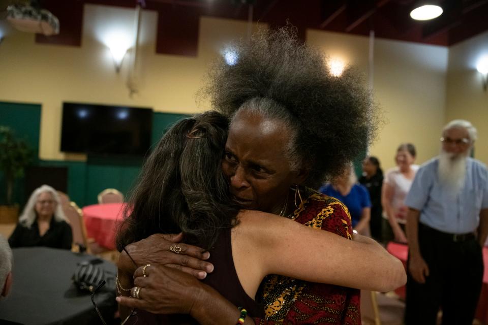 April Lidinsky hugs Debra Stanley at the Charles Martin Youth Center in South Bend on Friday, Aug. 11, 2023, during a ceremony to present Stanley with South Bend's Key to the City.