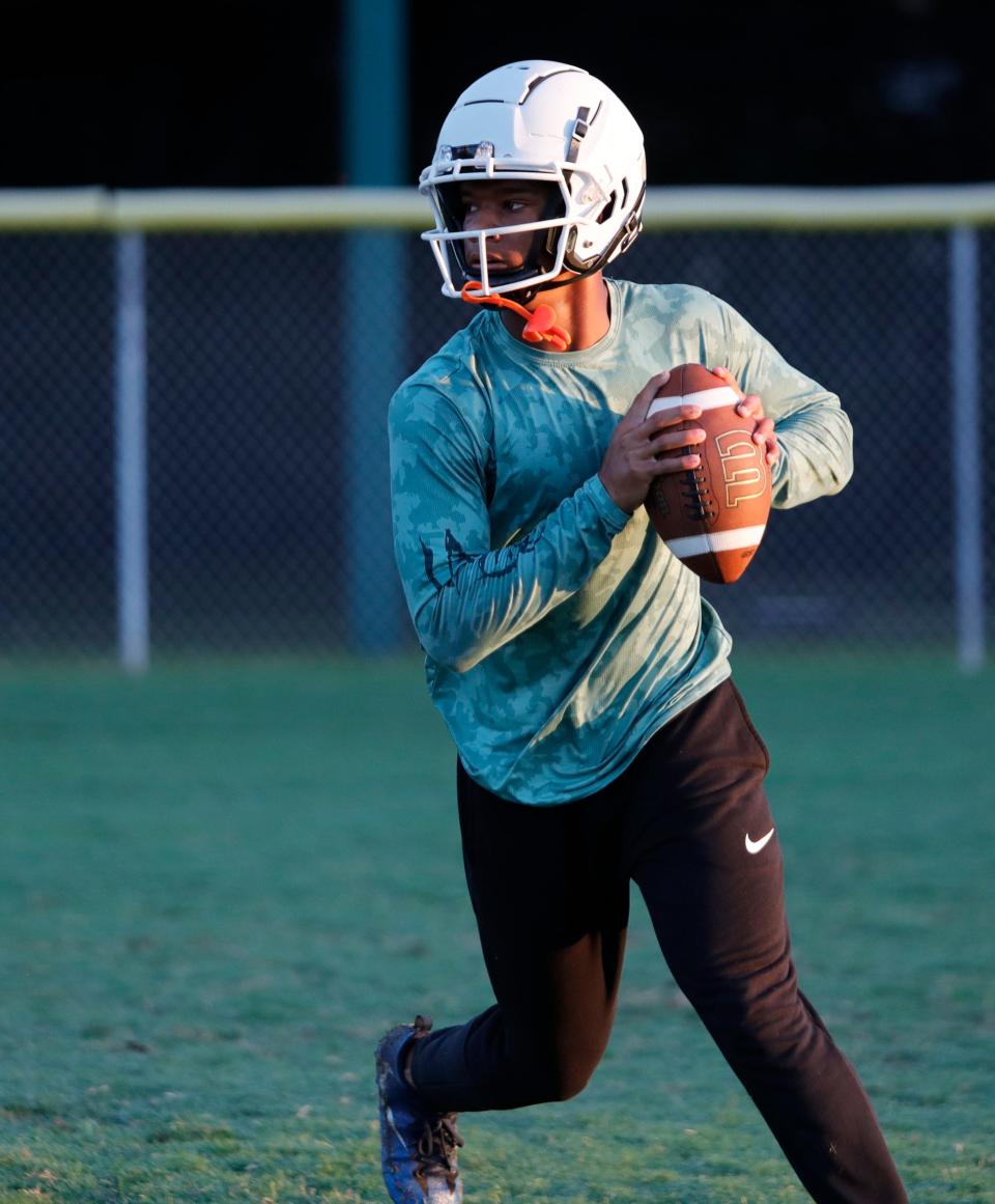 Chris McFoley, senior quarterback, practices passing drills. Fort Myers High School football players were up early on Tuesday, August 1, 2023, as practices got underway for their upcoming season. (Syndication: The News-Press)