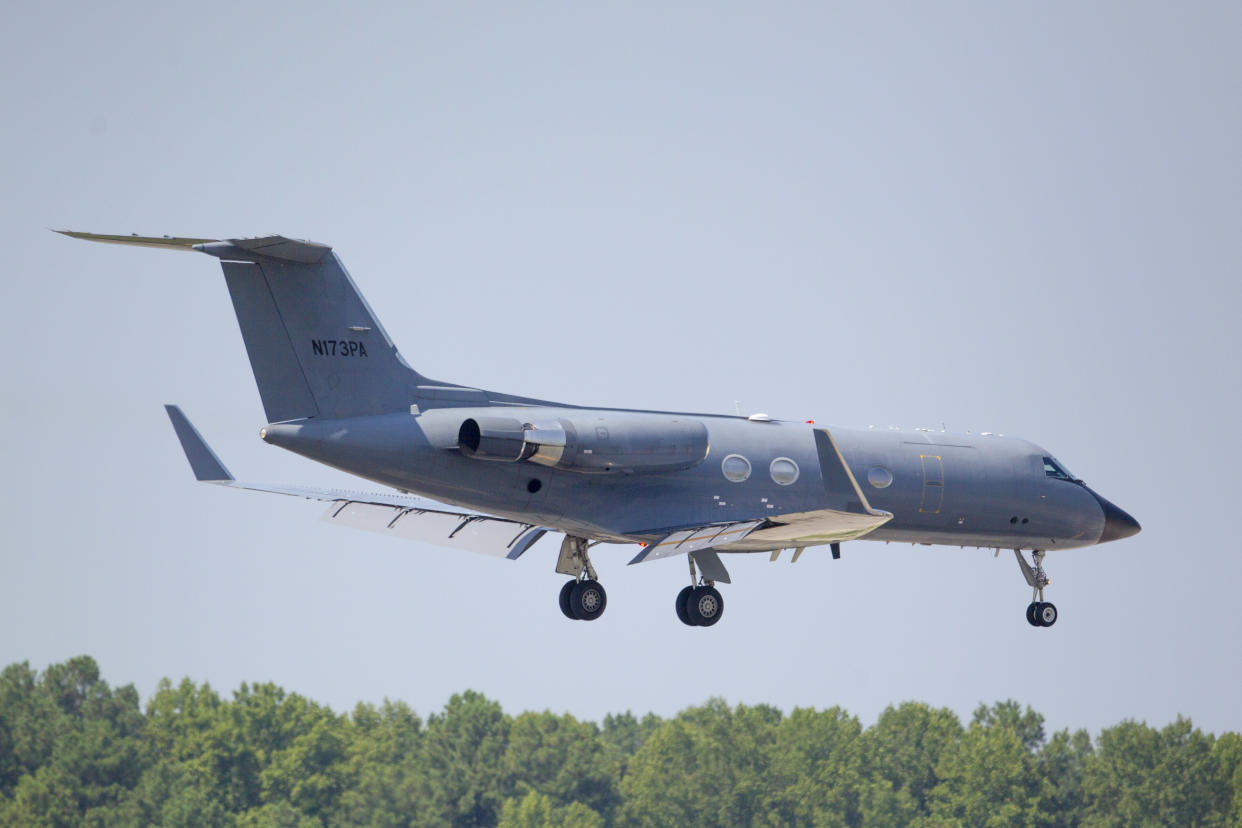 Phoenix Air lands near Atlanta on Aug. 5 with Nancy Writebol aboard in an isolation chamber. (AP/Todd Kirkland)