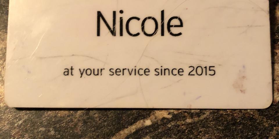 The name tag Nicole Johnson wore while working at a grocery store. (Photo: Courtesy of Nicole Johnson)