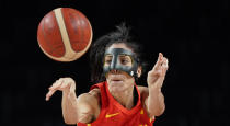 Spain's Cristina Ouvina (5) passes the ball during women's basketball preliminary round game against Canada at the 2020 Summer Olympics, Sunday, Aug. 1, 2021, in Saitama, Japan. (AP Photo/Eric Gay)