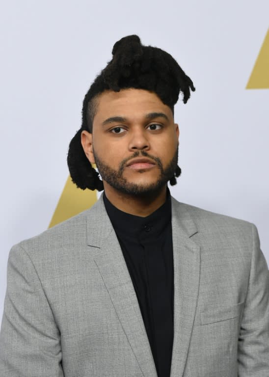 Canadian R&B singer The Weeknd began his career in near anonymity in 2010 as he posted songs on the Internet but rose to fame last year with "Can't Feel My Face"