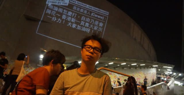 Sampson Wong and his “Add Oil Machine” during the 2014 Umbrella Movement in Hong Kong.