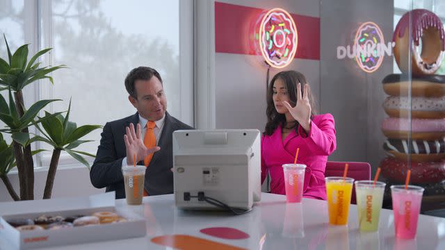 <p>Dunkin</p> Will Arnett and Natalie Marshall, or Corporate Natalie.