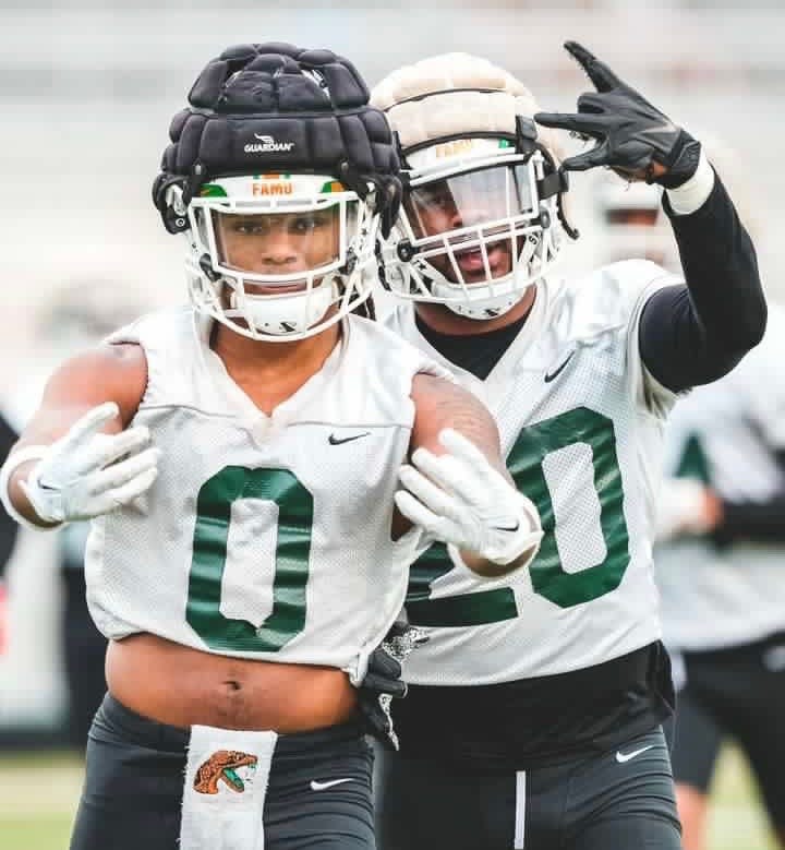 Florida A&M Rattlers linebacker Isaiah Major (0) and Jordan Moore (20) strikes a pose at a spring practice for the 2023 football season at Bragg Memorial Stadium, Tallahassee, Florida.