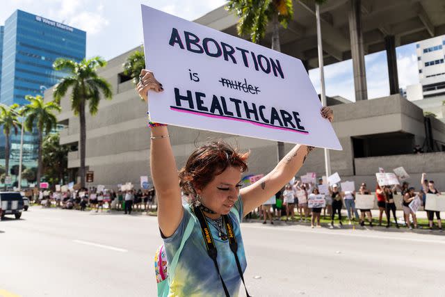 <p>John Parra/Getty</p> An abortion rights activist, July 2022