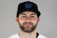 This is a 2021 file photo showing Jake Fishman of the Miami Marlins baseball team. Following a year without a season due to the coronavirus pandemic, thousands of minor league players are finally returning to work. Many haven't played in a game since 2019, and players found creative ways to stay in shape and stay sharp. Fishman, a left-hander for the Miami Marlins, began deadlifting a neighbor’s crane stabilizers — big hunks of metal used to keep trucks and other machinery in place.(Adam Glanzman/MLB Photos via AP, File)