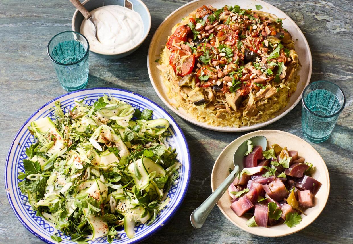 <span>Sami Tamimi’s Palestinian recipes for <em>iftar</em> (clockwise from top): a spicy <em>maqluba</em> of chicken, rice and veg, pickled aubergine with coriander seeds, and spicy herb and salted courgette salad.</span><span>Photograph: Ola O Smit/The Guardian. Food styling: Sam Dixon. Prop styling: Anna Wilkins. Food styling assistant: Kristine Jakobssen.</span>