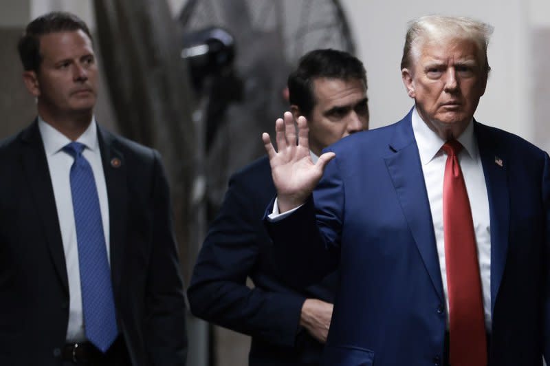 Former President Donald Trump returns after a break at Manhattan criminal court in New York on Monday. The court heard testimony from former Trump Organization controller Jeff McConney. Pool photo by Win McNamee/UPI