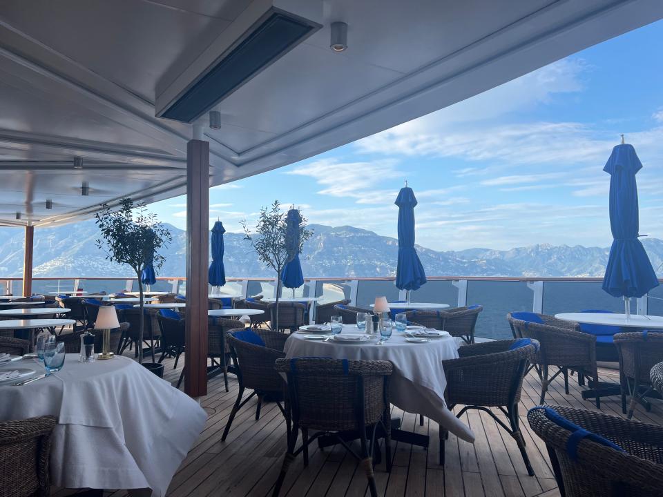 empty restaurant on the deck of a regent seven seas explorer cruise ship