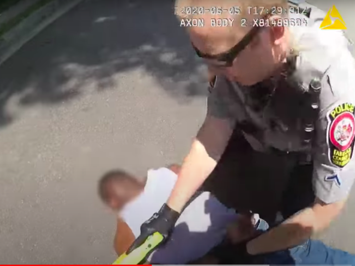 Police Officer Tyler Timberlake forcibly restrains an unarmed man after tasering him: Fairfax County Police Department