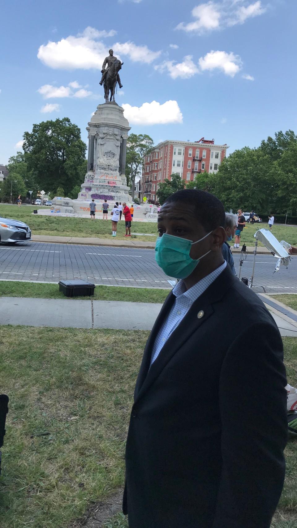 Virginia Lt. Gov. Justin Fairfax speaks next to the statue of Robert E. Lee in Richmond, Virginia, on June 4, 2020.