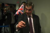 British European Parliament member Nigel Farage leaves the hemicycle after addressing European lawmakers during the plenary session at the European Parliament in Brussels, Wednesday, Jan. 29, 2020. The U.K. is due to leave the EU on Friday, Jan. 31, 2020, the first nation in the bloc to do so. (AP Photo/Francisco Seco)