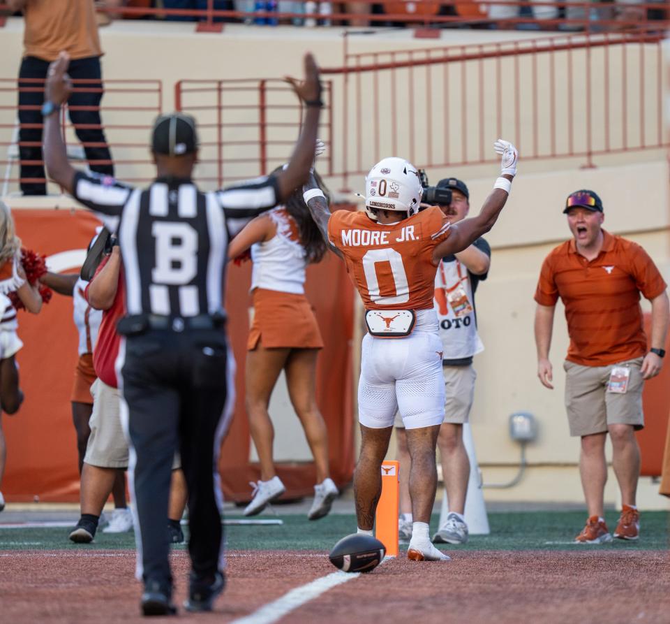 Texas Longhorns wide receiver DeAndre Moore Jr. (0) reacts to scoring a touchdown as the Texas Longhorns take on Mississippi State at Darrell K Royal-Texas Memorial Stadium in Austin Saturday, Sept. 28, 2024.