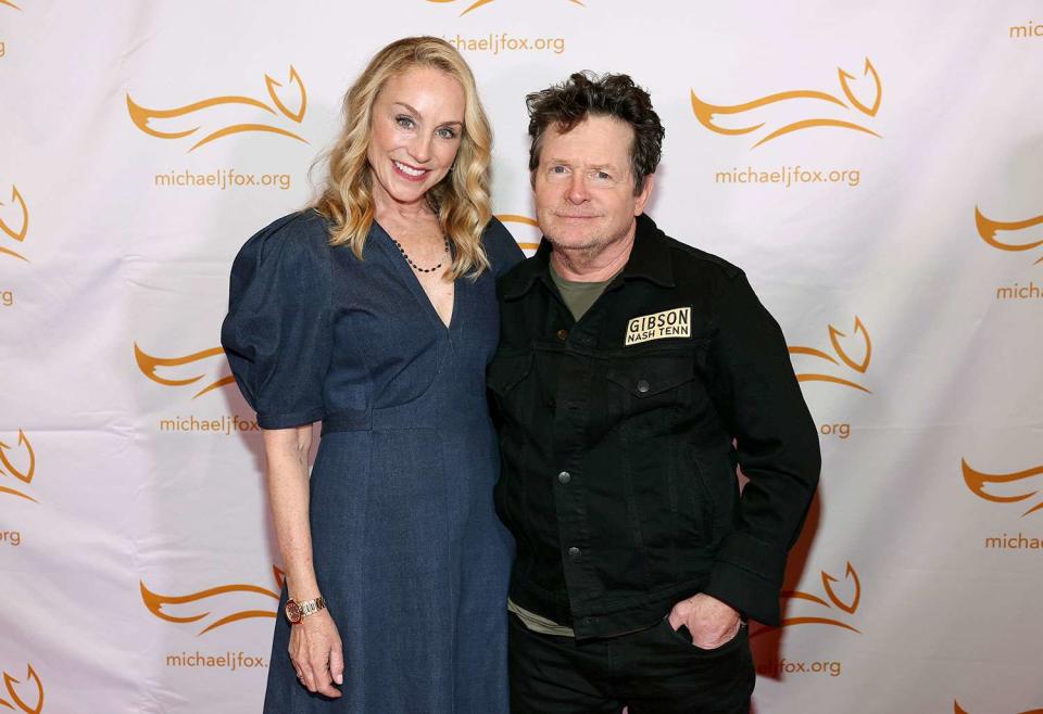 <p>Terry Wyatt/Getty</p> Tracy Pollan and Michael J. Fox