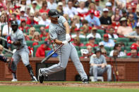 Chicago White Sox's Paul DeJong hits a ground rule double during the second inning of a baseball game against the St. Louis Cardinals, Sunday, May 5, 2024, in St. Louis. (AP Photo/Scott Kane)