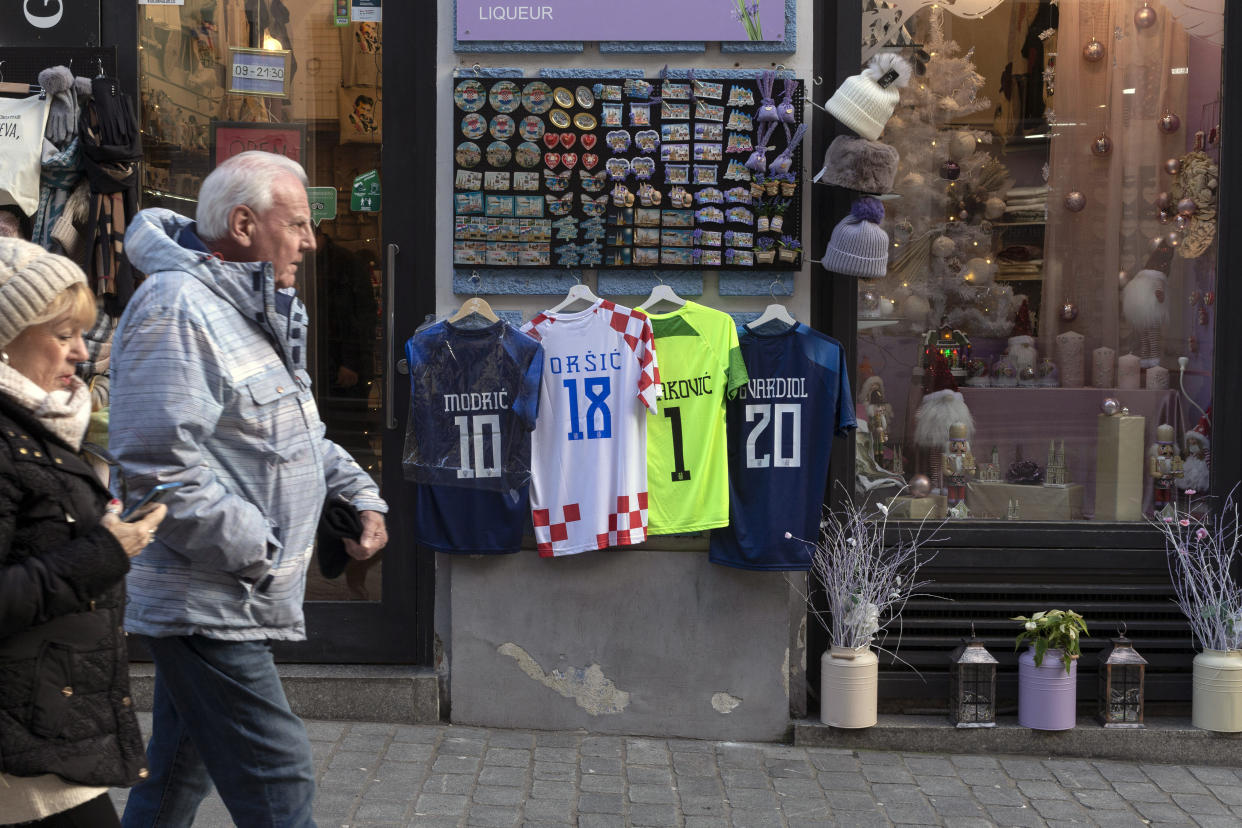 Croatia's national soccer team jerseys are seen at a souvenir shop ahead of the team's Qatar World Cup soccer semifinal match against Argentina, in Zagreb, Croatia, Tuesday, Dec. 13, 2022. (AP Photo/Marko Drobnjakovic)