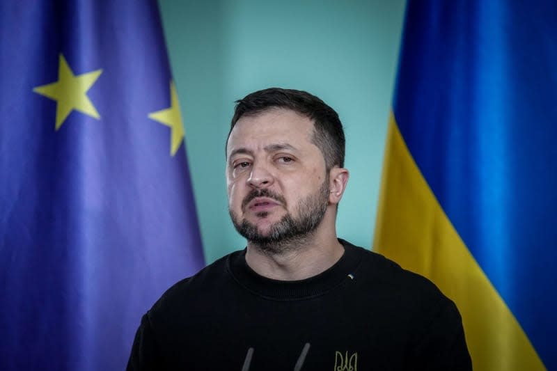 Ukrainian President Volodymyr Zelensky attends a press conference at the German Chancellery. Kay Nietfeld/dpa