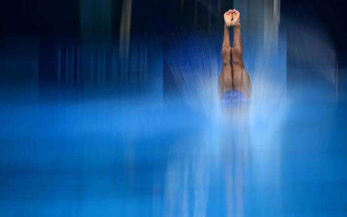 Egypt&#39;s Mohab Ishak competes in the preliminary round of the men&#39;s 3m springboard diving event during the Tokyo 2020 Olympic Games at the Tokyo Aquatics Centre in Tokyo on August 2, 2021.