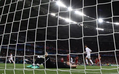 Liverpool's Loris Karius looks dejected after conceding their third goal - Credit: HANNAH MCKAY/REUTERS