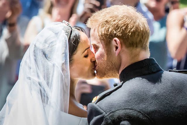 <p>DANNY LAWSON/POOL/AFP via Getty</p> Meghan Markle and Prince Harry at their royal wedding on May 19, 2018