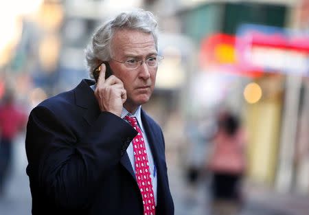 Former Chief Executive Officer, Chairman, and Co-founder of Chesapeake Energy Corporation Aubrey McClendon walks through the French Quarter in New Orleans, Louisiana in this March 26, 2012 file photo. REUTERS/Sean Gardner/Files
