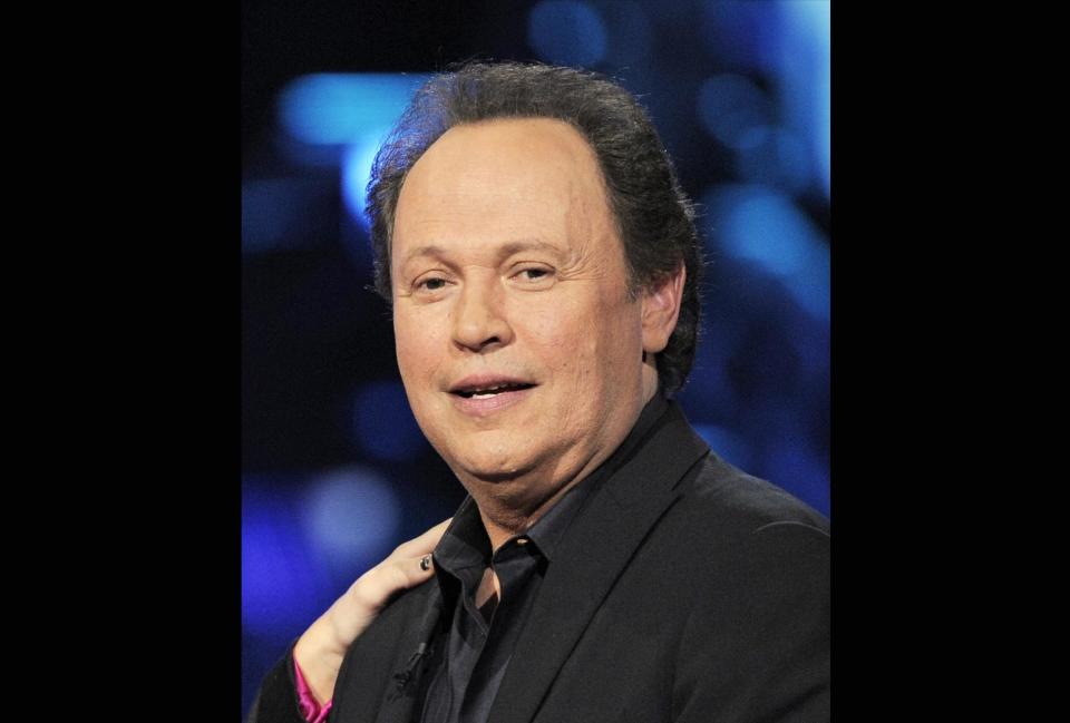 FILE - In this April 6, 2008 file photo, Billy Crystal is shown at the "Idol Gives Back" fundraising special of "American Idol" in Los Angeles. Actor Billy Crystal has helped raise $1 million to rebuild a beach town on New York's Long Island hard-hit by Superstorm Sandy, Saturday, June 22, 2013. (AP Photo/Mark J. Terrill, File)