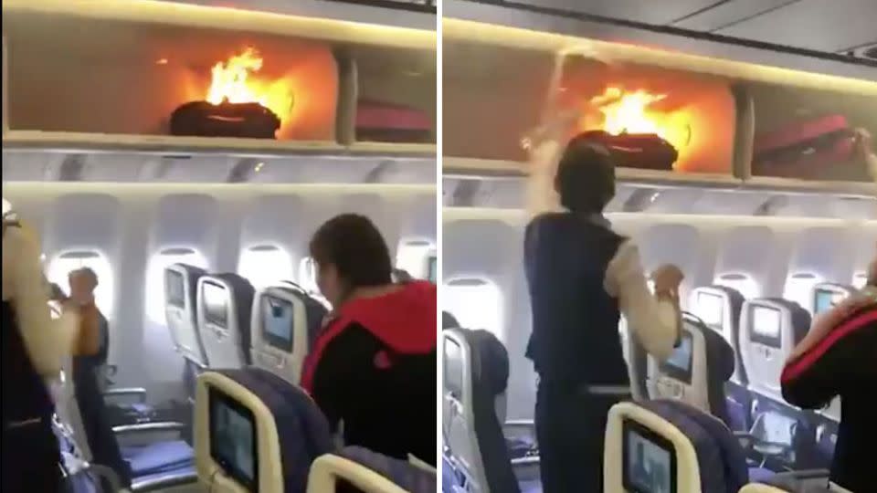 Cabin crew attempt to extinguish the flaming bag. Source: Twitter/ China Aviation Review