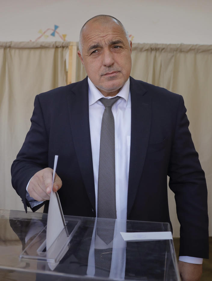 Bulgarian former Prime Minister Boiko Borisov, leader of the center-right GERB party, casts his vote at a polling station in Sofia, Bulgaria, Sunday, March 26, 2017. Bulgarians are heading to the polls for the third time in four years in a snap vote that could tilt the European Union's poorest member country closer to Russia as surveys put the GERB party neck-and-neck with the Socialist Party. (AP Photo/Vadim Ghirda)
