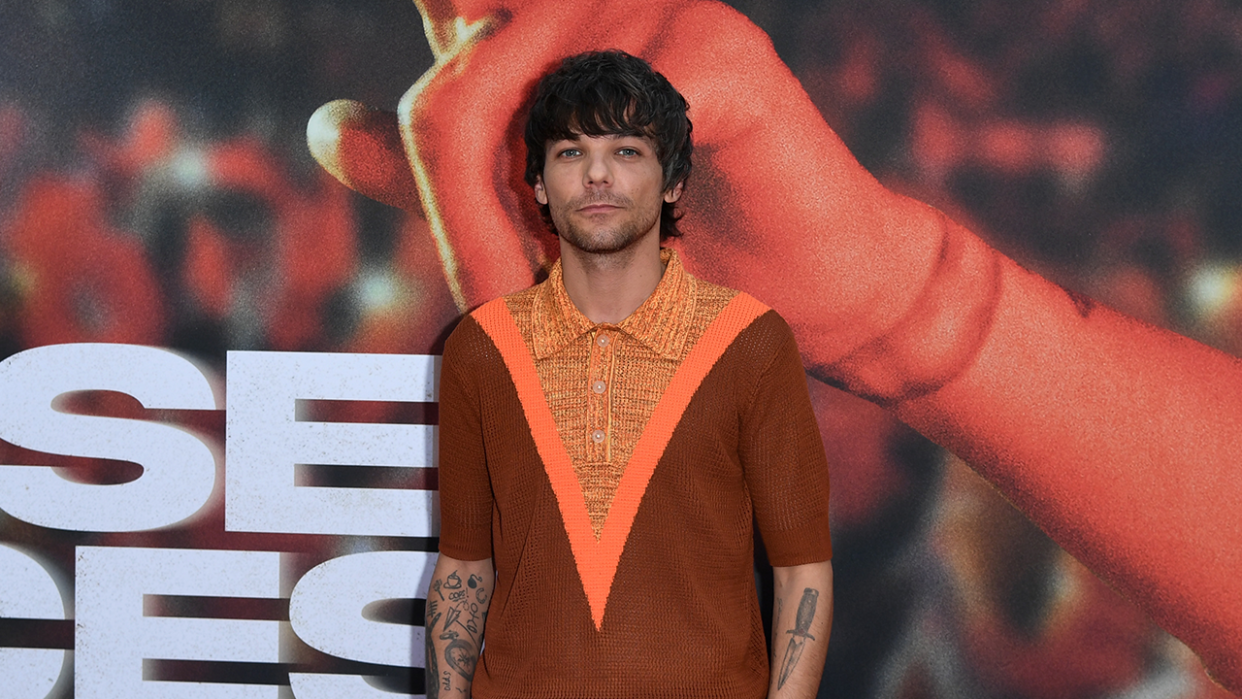  Louis Tomlinson attends the Los Angeles Premiere Of "All Of Those Voices" at The Ford Amphitheatre on May 13, 2023 in Los Angeles, California. . 