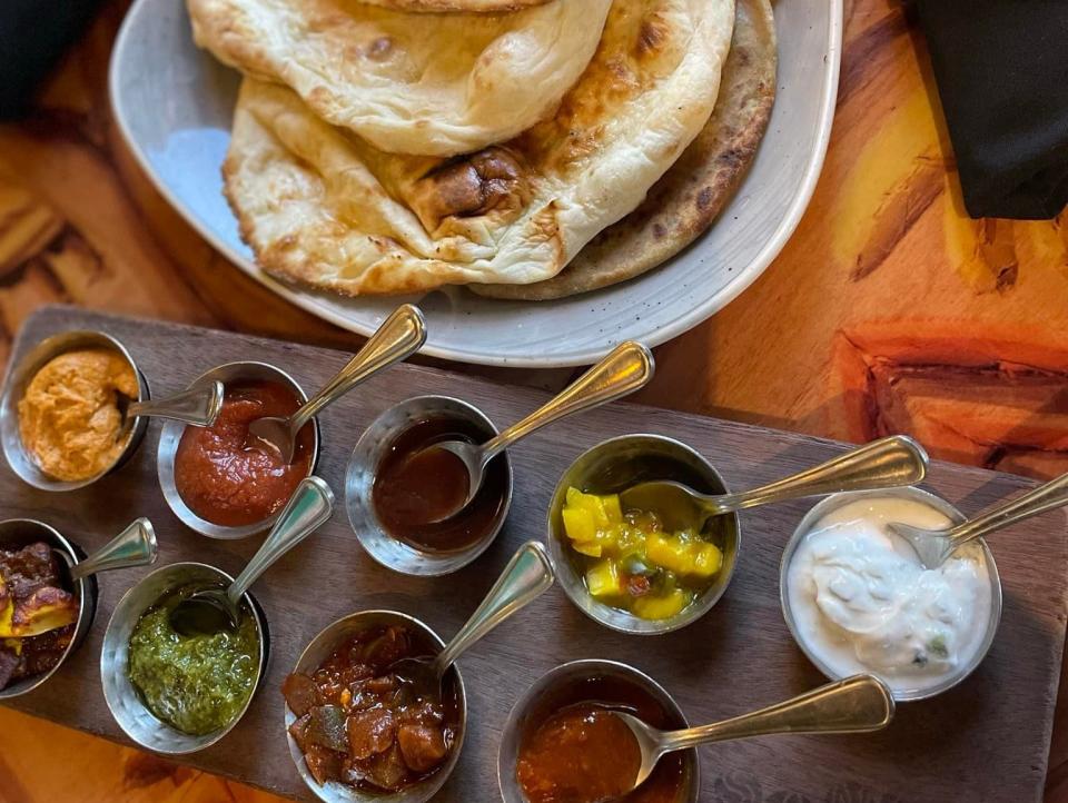 photos of the bread service with naan and dipping sauces from sanaa at animal kingdom lodge