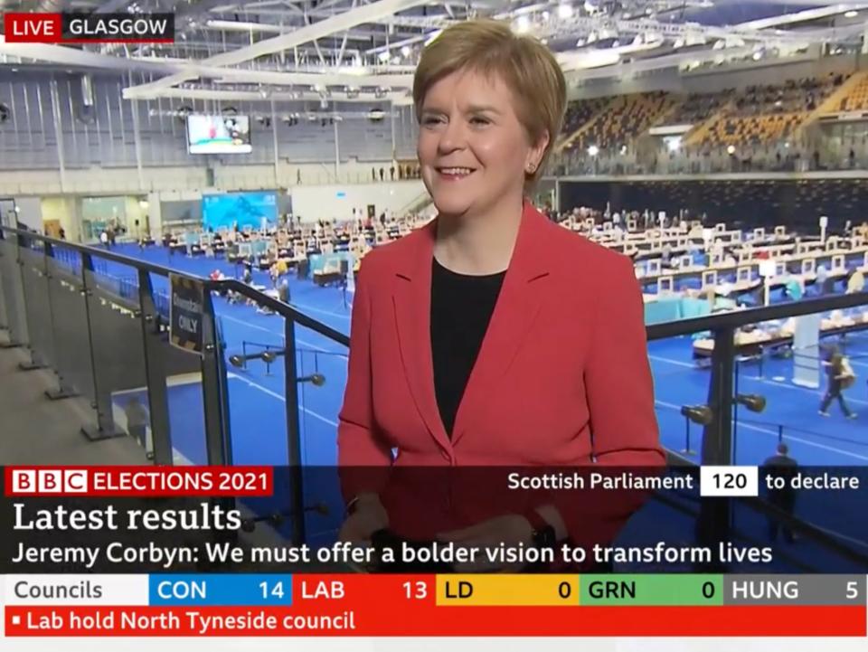 Sturgeon talks to reporters at the Emirates Arena (BBC News)