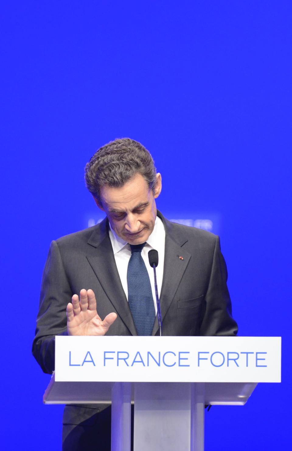 AFP Sarkozy concède sa défaite. PHOTO / ERIC FEFERBERG