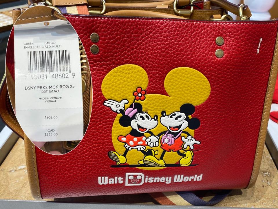 A Disney-themed Coach bag at Disney Springs in July 2022.