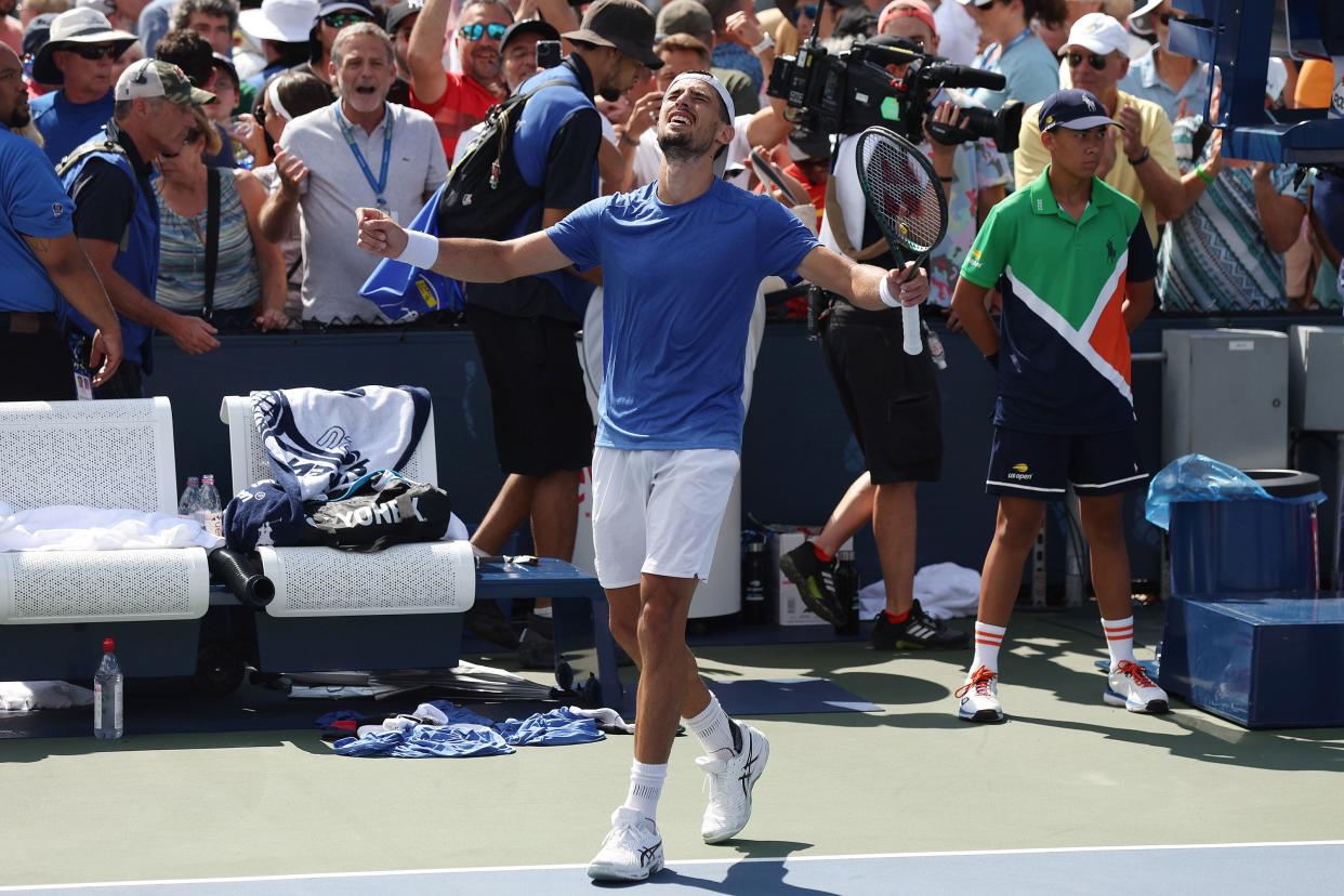 Pedro Cachin of Argentina celebrates after defeating Brandon Holt of the United States in their Men's Singles Second Round match on Day Three of the 2022 U.S. Open at USTA Billie Jean King National Tennis Center on Aug. 31, 2022, in Flushing, Queens.