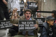 <p>Protesters shout their disapproval of the Republican tax bill outside the Senate Budget Committee hearing room on Capitol Hill in Washington, Tuesday, Nov. 28, 2017. (Photo: J. Scott Applewhite/AP) </p>