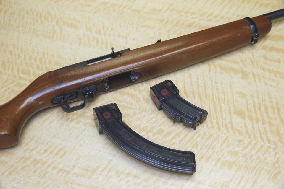 A semi-automatic rifle displayed with a 25 shot magazine, left, and a 10 shot magazine, right, at a gun store in Elk Grove, Calif. San Diego-based U.S. District Judge Roger Benitez declared, on March 29, 2019, unconstitutional the law banning possession of magazines containing more than 10 bullets.