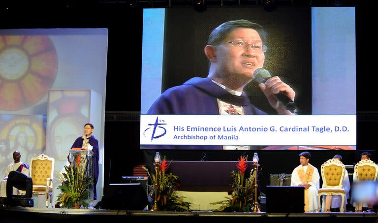 The Archbishop of Manila, Cardinal Luis Antonio Tagle, pictured celebrating mass in Manila, on February 16, 2013. Filipinos are hoping that 55-year-old Tagle, who was only made a cardinal last year, could become the next pope following the announcement by 85-year-old Pope Benedict XVI that he would resign due to health reasons