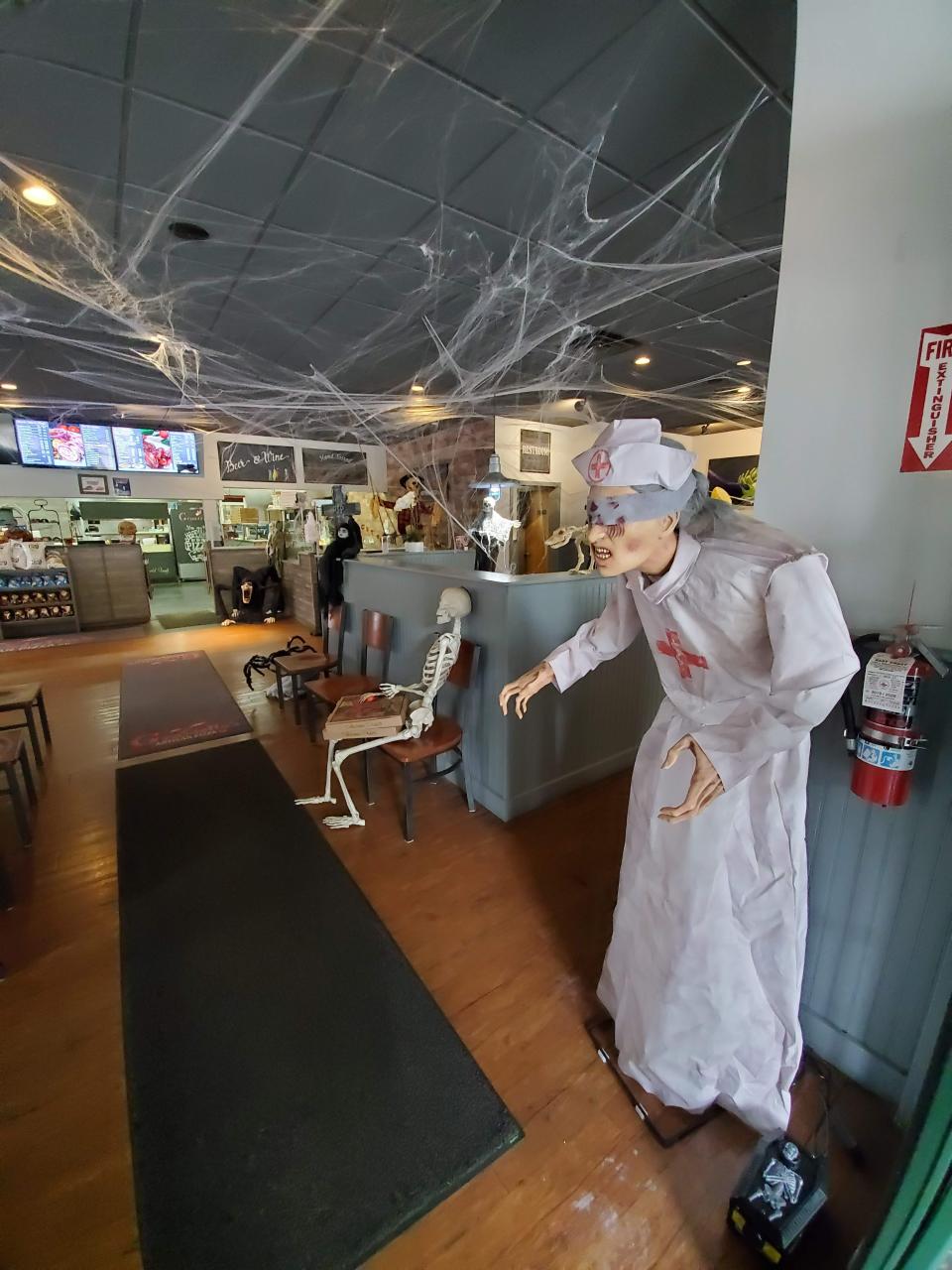 Last year, this nurse was one of a dozen figures that greeted guests at Graziella's Artisan Pizza Co. in Sandwich. The restaurant is again decorated for the holiday and will hold a Halloween party for guests.