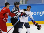 Ice Hockey - Pyeongchang 2018 Winter Olympics - Men's Preliminary Round Match - Olympic Athletes from Russia v U.S. - Gangneung Hockey Centre, Gangneung, South Korea - February 17, 2018 - Olympic Athlete from Russia Nikolai Prokhorkin clashes with Jordan Greenway of U.S. REUTERS/Brian Snyder