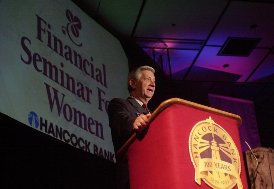 Hancock Holding CEO George Schloegel speaks at a Hancock Bank Financial Seminar for Women at the Mississippi Coast Coliseum Convention Center in Biloxi.