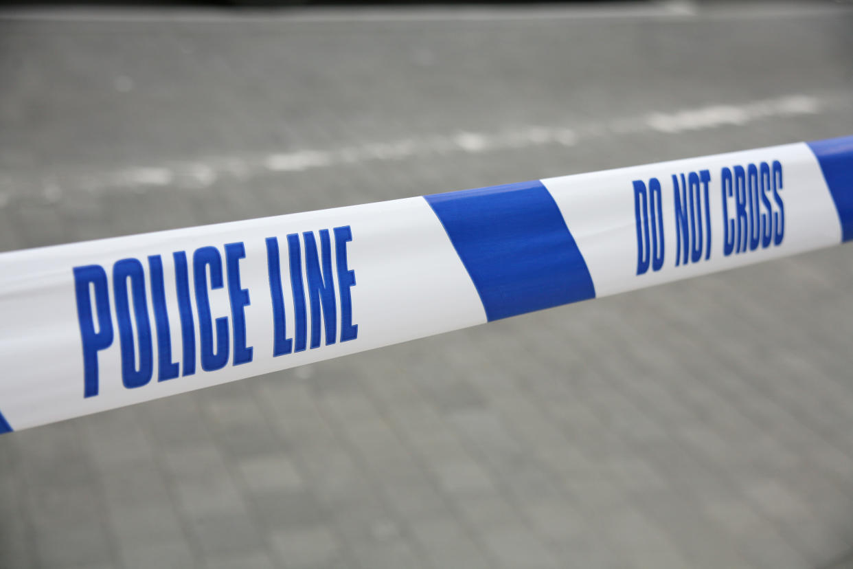 Cordoned off police line in london outside parliament. Cobblestone background. shallow DOF. 