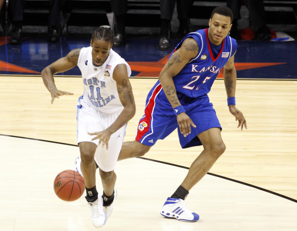 Apr 5, 2008; San Antonio, TX, USA; North Carolina Tar Heels guard Quentin Thomas (11) steals the ball from Kansas Jayhawks guard <a class="link " href="https://sports.yahoo.com/nba/players/4475/" data-i13n="sec:content-canvas;subsec:anchor_text;elm:context_link" data-ylk="slk:Brandon Rush;sec:content-canvas;subsec:anchor_text;elm:context_link;itc:0">Brandon Rush</a> (25) during the second half of the semi-finals of the 2008 NCAA Mens Final Four Championship at the Alamodome. Mandatory Credit: Bob Donnan-USA TODAY Sports