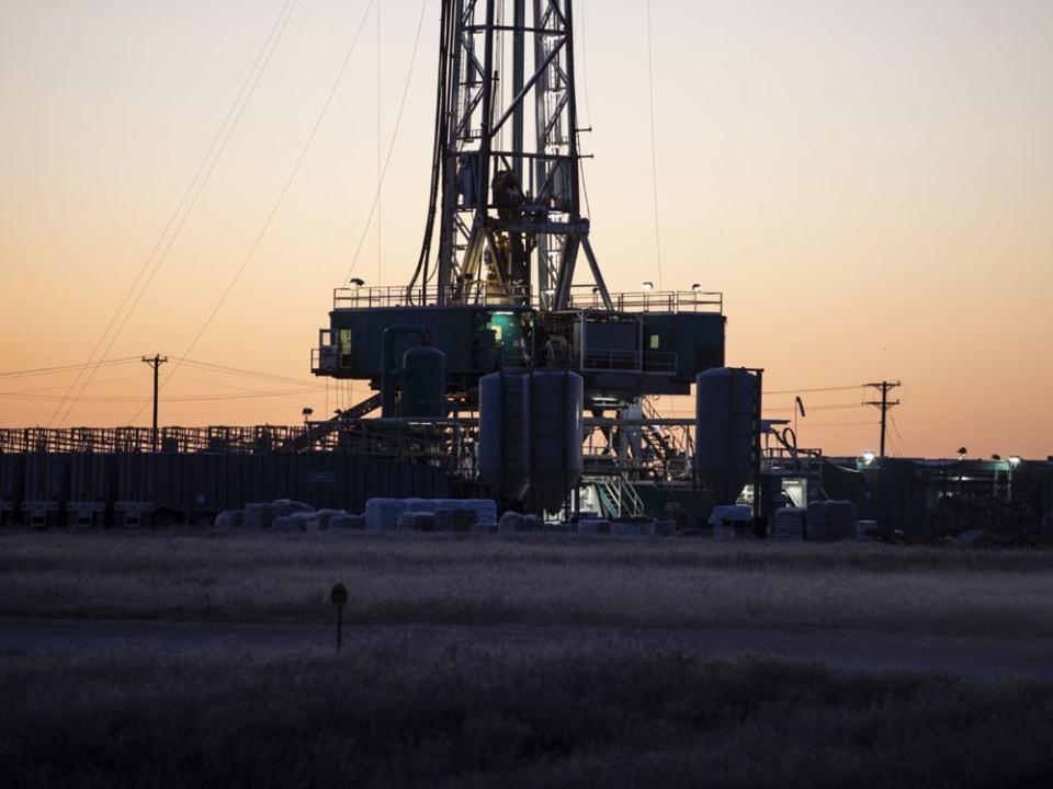  An active oil drilling rig in Midland, Texas, U.S.