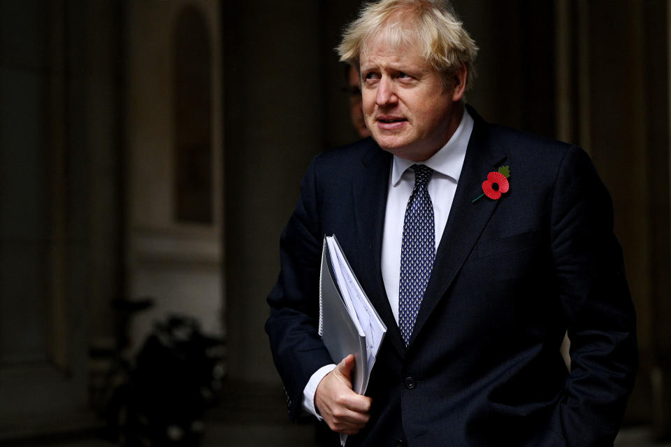 Britain's Prime Minister Boris Johnson returns to number 10, Downing Street following the weekly Cabinet meeting at the Foreign Office in London, on Nov. 10, 2020.<span class="copyright">Leon Neal—Getty Images</span>