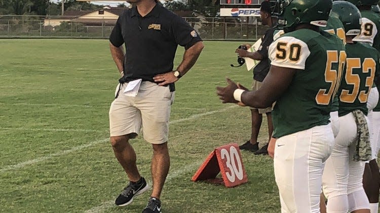 Suncoast coach Brian Pulaski walks the sidelines during a spring football jamboree in May 2018 at Santaluces High School.