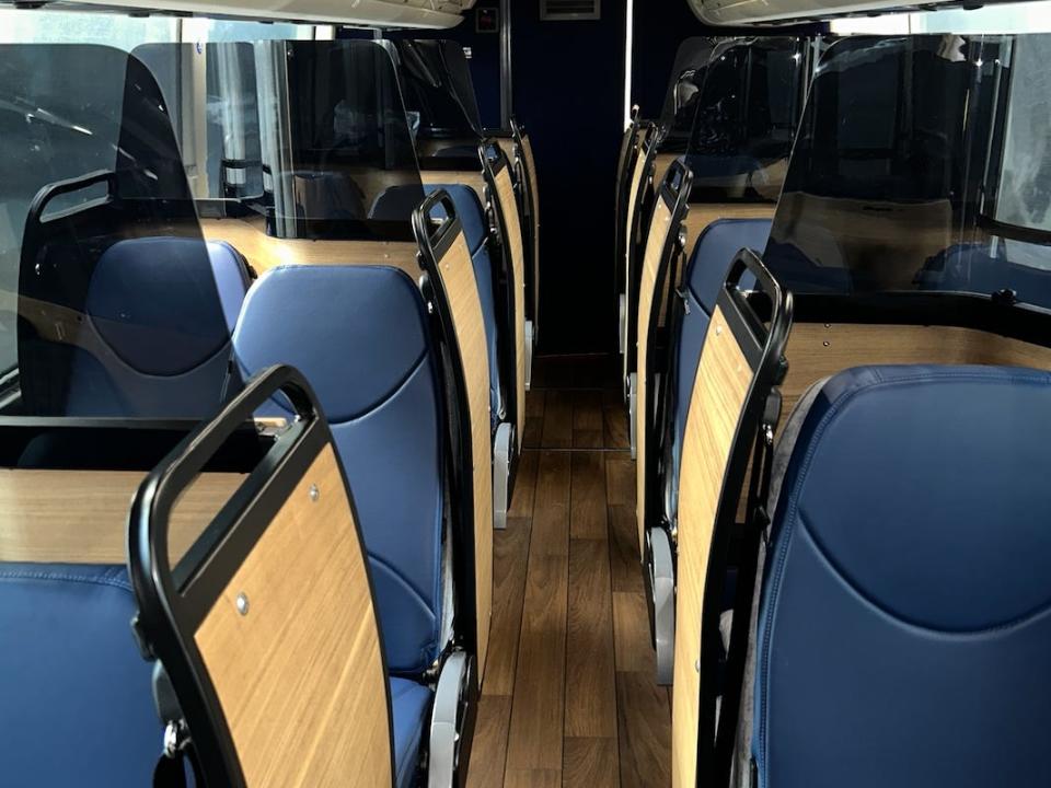 blue seats in cubbies on napaway bus