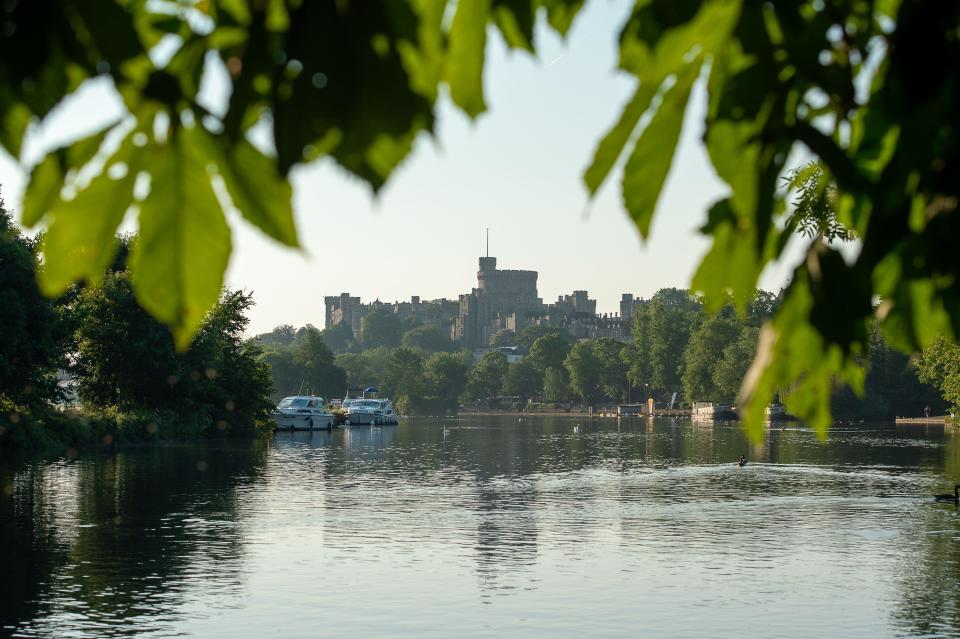 Windsor, Berkshire, UK. 13th June, 2023. Views of Windsor Castle from the River Thames. After torrential rain and thunderstorms in Windsor yesterday, it was sunny morning by the River Thames. Temperatures are expected to reach 29 degrees today. Credit: Maureen McLean/Alamy Live News