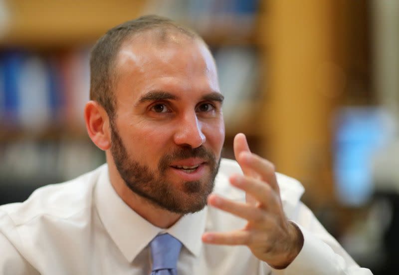 Argentine Economy Minister Martin Guzman gestures during an interview with Reuters, in Buenos Aires