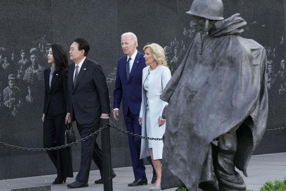 President Joe Biden, first lady Jill Biden, South Korea's President Yoon Suk Yeol and his wife Kim Keon Hee visit the Korean War Veterans Memorial in Washington, Tuesday, April 25, 2023. (AP Photo/Susan Walsh)